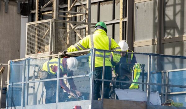 Constructions workers on a building site in Belfast.